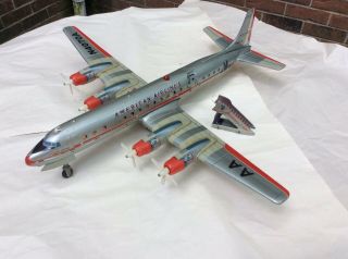 Yonezawa Tin Litho American Airlines Dc - 7c Airliner