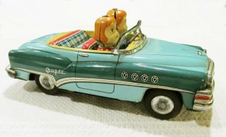 Vintage Tin Friction Toy Car Conversing Couple Buick Convertible Japan