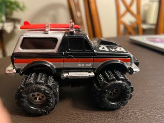 Awesome Running Black Schaper Stomper Ford Bronco with Surf Board 2