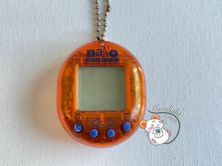 My Nano Puppy Transparent Clear Orange Playmates Virtual Pet 1998