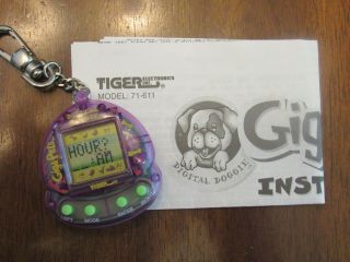 1997 Giga Pets Digital Doggie Tiger Keychain Virtual Pet Instructions