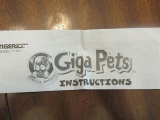 1997 Giga Pets Digital Doggie Tiger Keychain Virtual Pet instructions 3