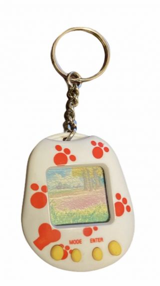 1997 Mga Nano Puppy Dog Giga Pets Tamagotchi Virtual Pet Key Chain