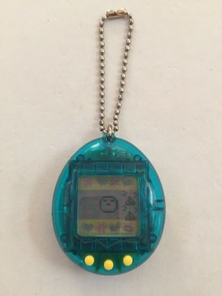 Vintage 1997 Bandai Tamagotchi Virtual Pet Clear Blue With Yellow Buttons