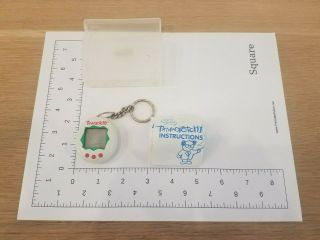 Tamagotchi Red,  White,  And Green Vintage Antique