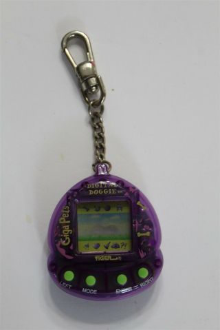 Vintage Tiger 1997 Giga Pets Digital Doggie Virtual Purple Key Chain