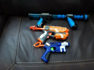 2 Nerf Guns 1 Ball Gun And 12 Unopend Bullets
