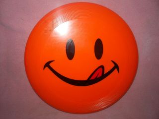 Vintage Bright Orange Smiley Face Flying Disc Frisbee